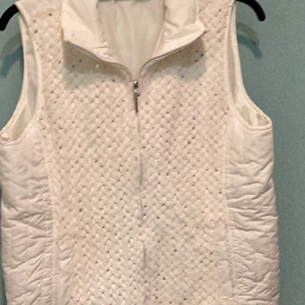 Cream colored vest, size M